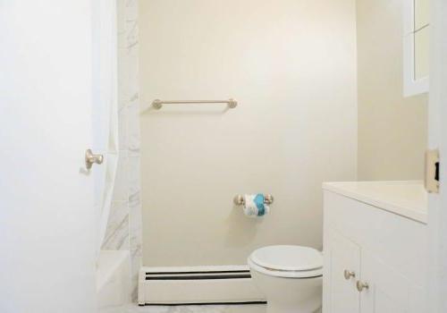 White modern bathroom with bathtub